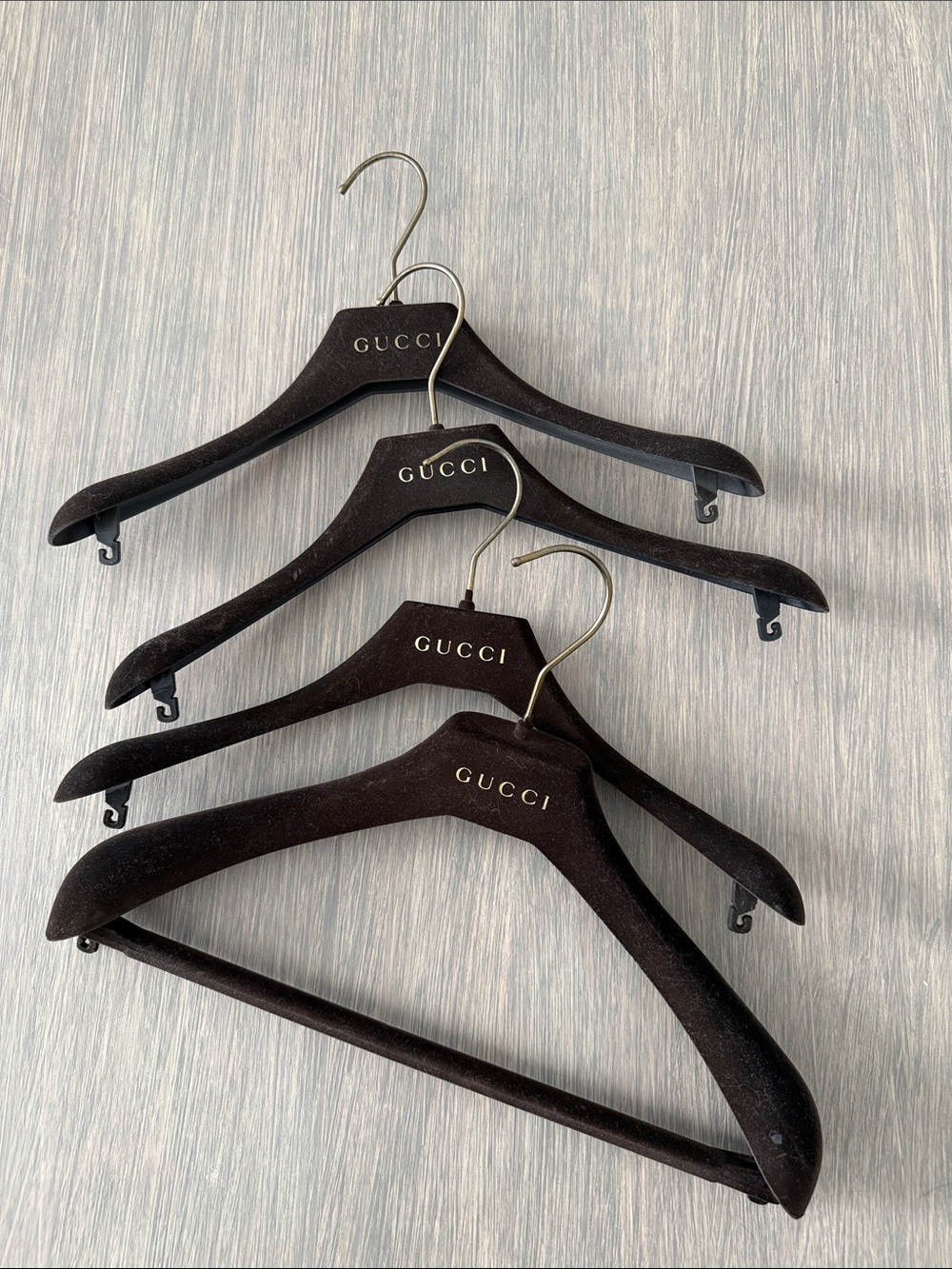Gucci Black Velvet Logo Hangers with Gold Lettering - Set of 4